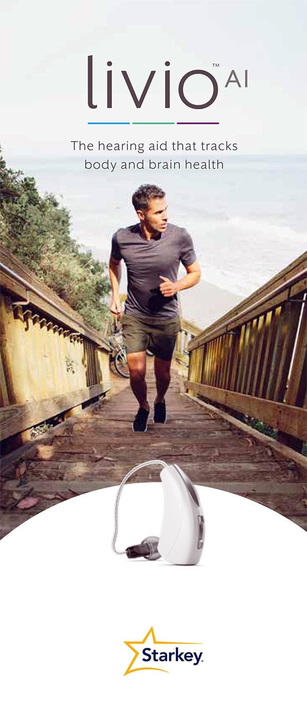 A man walking across a bridge with a hearing aid in front