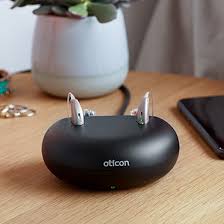 Assistant A black device on a table